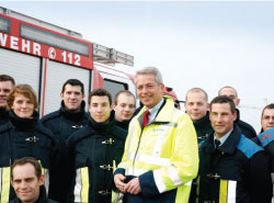 Dr Stefan Schulte, Chairman of the Executive Board, Fraport AG, pictured with new Fraport trainees for the FRA Fire Department, who have been recruited because of the capacity expansion at Frankfurt Airport.