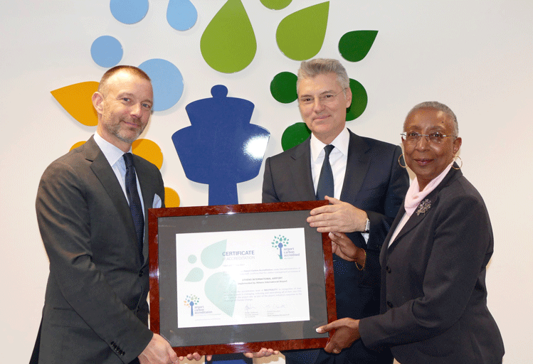 Olivier Jankovec (left), Director General ACI EUROPE, giving the Neutrality certificate to Dr. Yiannis Paraschis, CEO Athens Airport, with Angela Gittens, Director General ACI World.