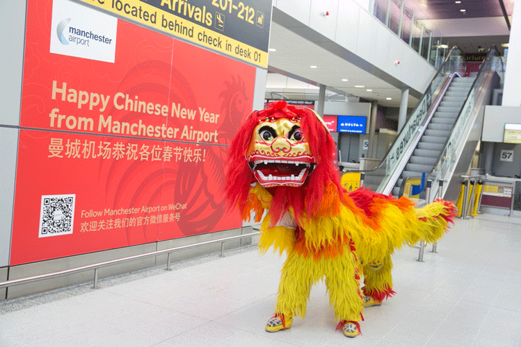 Manchester Airport has celebrated Chinese New Year with a lion dance and traditional Chinese dancers entertaining passengers.
